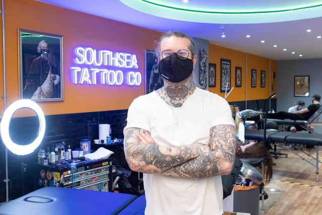 Southsea Tattoo Company owner Tim Childs is delighted to be open once again after losing around £30,000 of takings across both lockdowns.

Picture: Keith Woodland