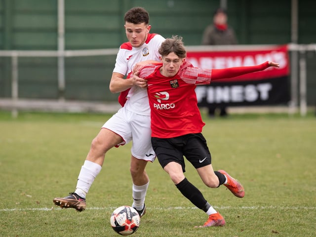 Horndean's Ben Anderson holds back Fareham's Connor Underhill. Picture: Keith Woodland
