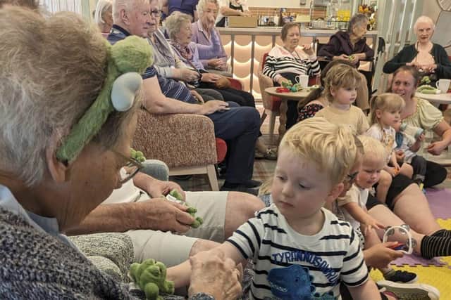 Resident interacting with child