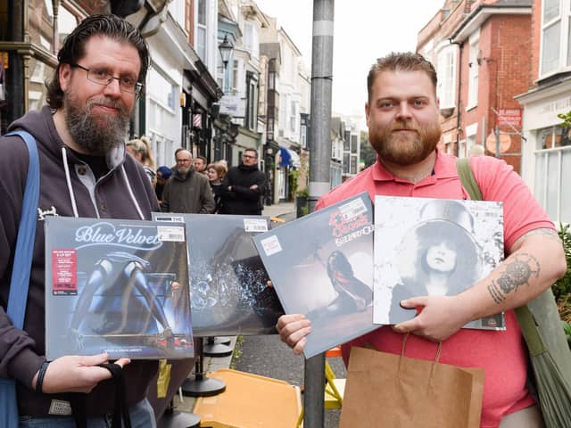 Simon Herne and Bradley Sunderland with their purchases from Pie and Vinyl. Picture: Keith Woodland (230421-8)