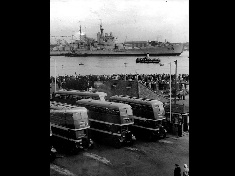 Provincial buses lined up at Gosport Ferry Gardens as HMS Vanguard leaves Portsmouth Habour for the last time in August 1960
