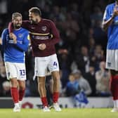 Kieron Freeman, left, with Pompey skipper Clark Robertson