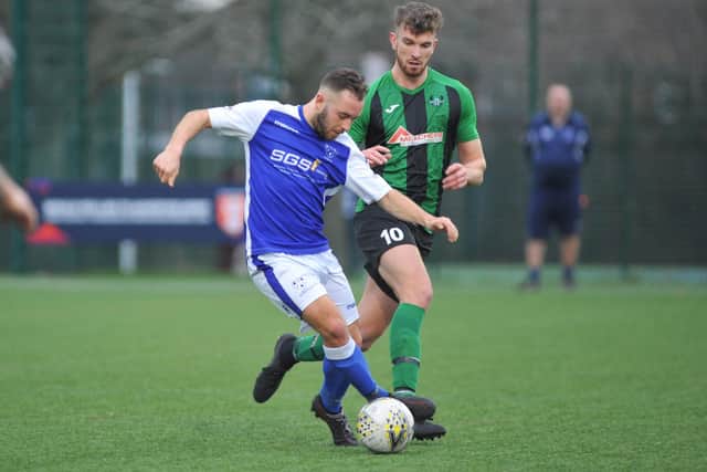 Denmead's Danny Lucas on the ball against Lyndhurst. Picture: Martyn White