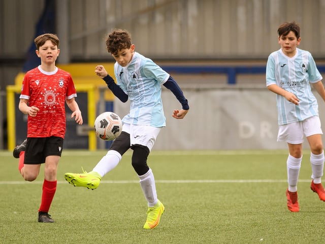 Action from the Portsmouth Youth League Geldard Invitation Cup final between Jubilee 77 U13s and Castle United U13s (light blue and white kit). Picture: Keith Woodland (190321-795)