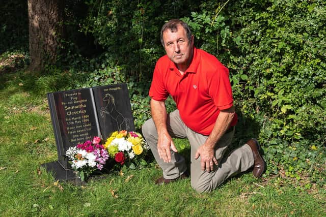 Colin Cleverley (61) at his daughter's grave in Denmead. Picture: Mike Cooter (060921)
