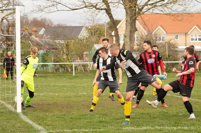 Elliot Spencer (nearest camera) scores for Hayling during the 5-0 win at Locks Heath in March. Spencer won the his manager's player of the season award. Picture: Keith Woodland