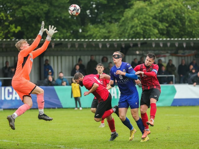 Petersfield keeper Harry Greenfield about to collect the ball. Picture by Nathan Lipsham