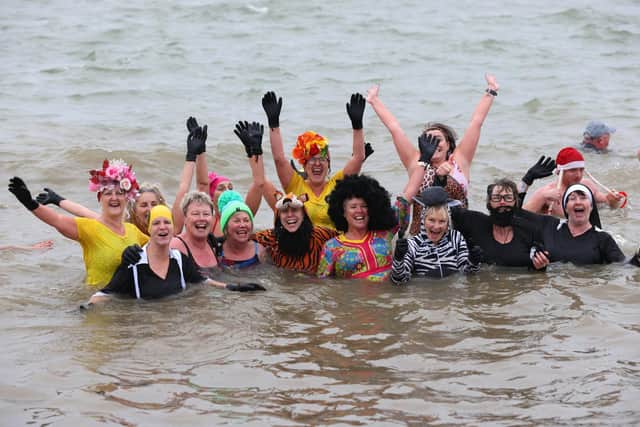 The 2023 Gafirs New Years Day Dip, an annual New Year's Day dip in the Solent. Pictured is action from the event.

1st January 2023

Photograph by Sam Stephenson, 07880 703135, www.samstephenson.co.uk.