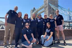 University of Portsmouth scientists with rowers from Team Ithaca before the team set off from Tower Bridge