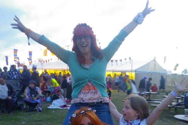 Porsche McGregor-Sims (middle) with mum Fiona Hawke (top), and sisters Tempest (bottom) and Pippin (right) at Camp Bestival