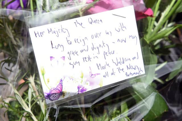 Portsmouth residents were given the opportunity to come together and mark the passing of Queen Elizabeth II with a vigil in Guildhall Square on Friday, September 9.
Picture: Sarah Standing (090922-2664)