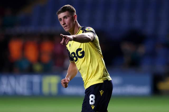 (Centre midfield - Oxford United): Pace: 64; Shooting: 66; Passing: 69; Dribbling: 68; Defending: 61; Physicality: 71.