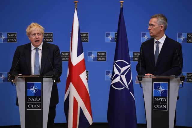 Prime Minister Boris Johnson (left) during his meeting with Nato secretary general Jens Stoltenberg at Nato Headquarters in Brussels, Belgium, as tensions remain high over the build-up of Russian forces near the border with Ukraine.