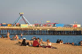 People enjoy the evening sunshine on Southsea beach.
(Photo by Finnbarr Webster/Getty Images)
