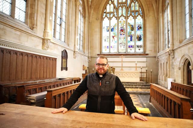 The Rev Alex Coakley-Youngs, team vicar, in the refurbished All Saints Church, Buckland