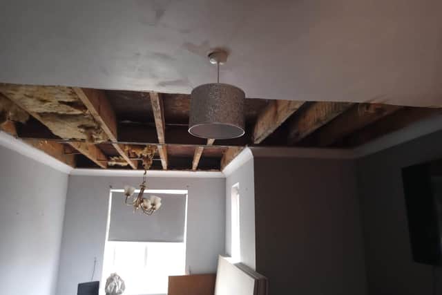 The ceiling has been stripped out but work cannot be done as water is still dripping through.
