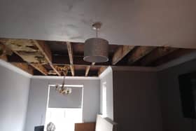 The ceiling has been stripped out but work cannot be done as water is still dripping through.