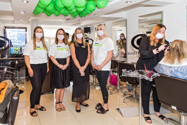 Leyla Celik (18), Sylwia Field (36), Debbie Hulbert (59) and Olivia Lawrence (17) from The Charter Cutting Company in Emsworth celebrate their 36th anniversary by holding a fundraising day for Rowan's Hospice. Picture: Mike Cooter (240621)