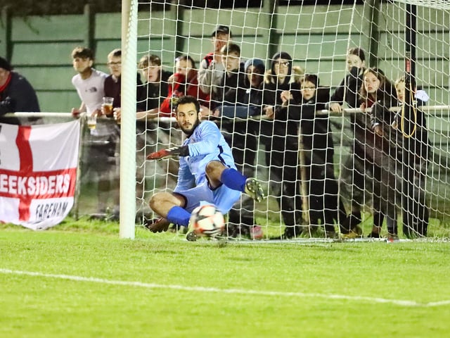 Fleetlands keeper Ollie Carroll goes the wrong way in the shoot-out. Picture by Ken Walker