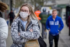 People are wearing masks to protect themselves against coronavirus in Commercial Road, Portsmouth on March 20, 2020. Picture: Habibur Rahman