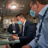 Alan Mak MP, centre,  pictured during his tour of the National Maritime Systems Centre, on Portsdown Hill