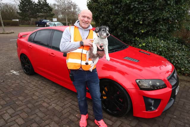 Port Solent Car Meet. Event organiser Jason White with his dog Muttley.Picture: Stuart Martin (220421-7042)