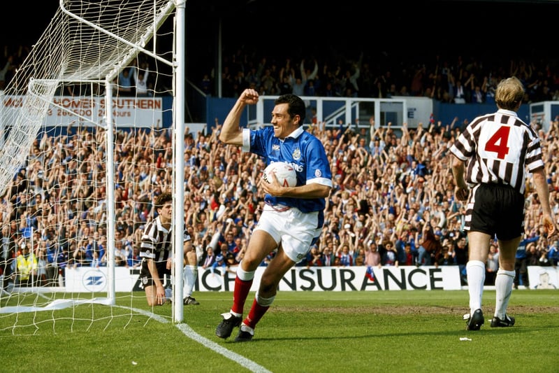Portsmouth striker Guy Whittingham celebrates a goal during a League Division One match between Portsmouth and Grimbsy Town at Fratton Park on May 8, 1993. Whittingham scored a record 42 league goals during that 1992/93 season.  (Photo by Simon Bruty/Allsport/Getty Images)