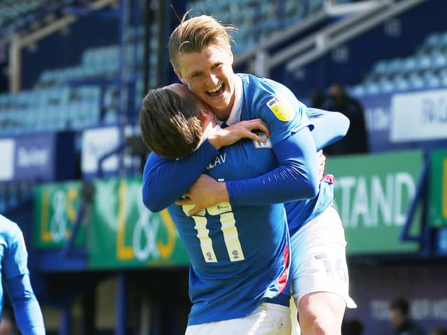 Ronan Curtis celebrates scoring his Pompey winner against Bristol Rovers with his goal's architect - George Byers. Picture: Joe Pepler