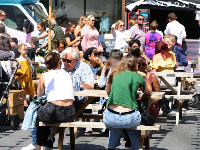 Sun, street food and drink, what more could you want?  Picture: Sarah Standing (010825-1411)