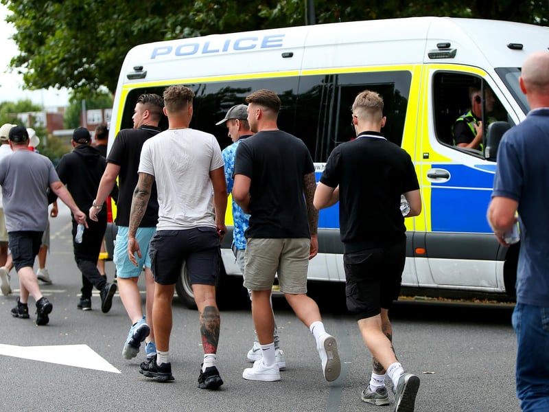 Protestors at Guildhall Square, Portsmouth. Demonstrators having verbal exchanges with officers. Picture: Chris  Moorhouse (030824-48)
