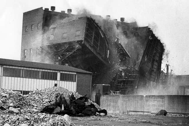 After the power station chimneys had been dismantled brick by brick the main structure was brought down by explosives. Portsmouth power station, Gunwharf Road, July 1983. Picture: PP467 The News, Portsmouth Archive.