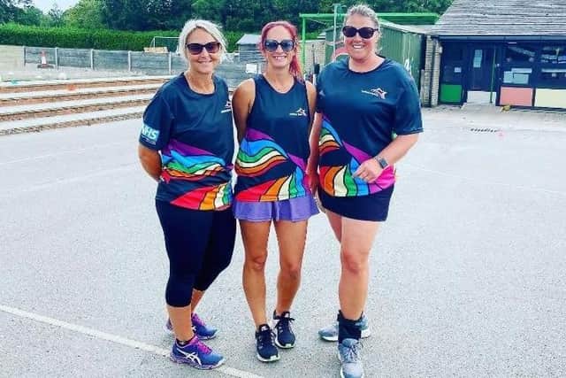 Members of Sarisbury Sparks netball team, based in Warsash, raised money for the NHS by holding a t-shirt design competition, which was won by Elysia Wilson. Pictured: Coaches Karen Watkins, Nikki Dunning and Alex Hughes wearing the winning design