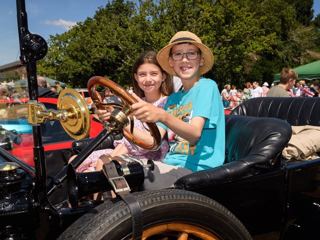 Eva, aged eight, and Fynn Patterson, aged 10, in a 1915 Model T.