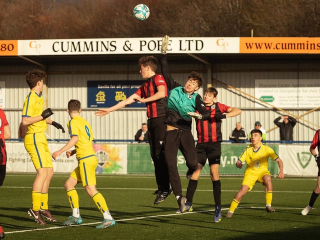 Action from the U16 GEC Marconi Invitation Cup final between Horndean Hawks Condors (red/black) and Pickwick Youth Panthers (yellow). Picture: Keith Woodland (260221-490)
