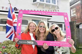 Siobhan Wilson, left, with her twin sister Charlotte Burgess-Kelly, right and good friend Maxine Hennessy, in Langstone High Street (070523-3680)