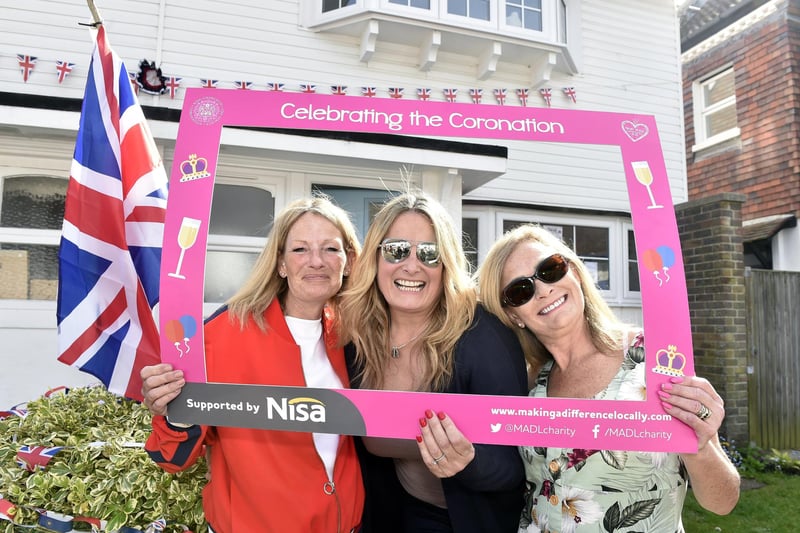 Siobhan Wilson, left, with her twin sister Charlotte Burgess-Kelly, right and good friend Maxine Hennessy, in Langstone High Street (070523-3680)