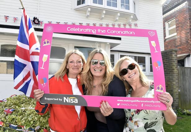 Siobhan Wilson, left, with her twin sister Charlotte Burgess-Kelly, right and good friend Maxine Hennessy, in Langstone High Street (070523-3680)