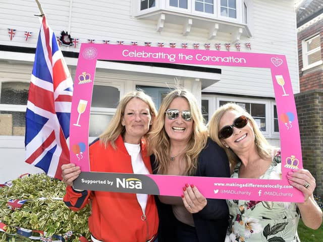 Siobhan Wilson, left, with her twin sister Charlotte Burgess-Kelly, right and good friend Maxine Hennessy, in Langstone High Street (070523-3680)