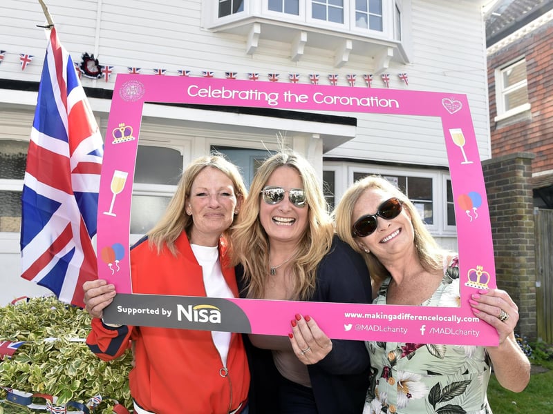 Siobhan Wilson, left, with her twin sister Charlotte Burgess-Kelly, right and good friend Maxine Hennessy, in Langstone High Street (070523-3680)