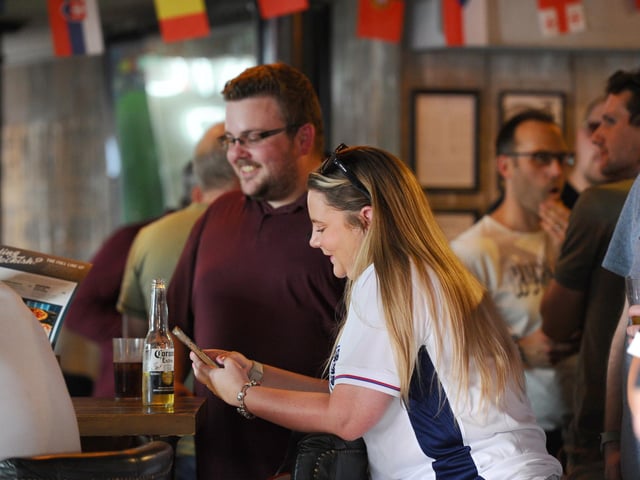 England fans at O'Neils in Albert Road, Southsea, watching the England v Denmark match in the Euro's.Picture: Sarah Standing (200624-1069)