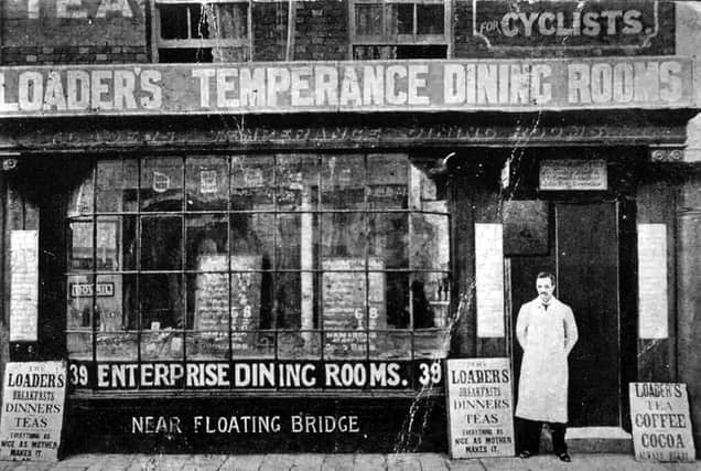Located at the lower end of Broad Street we see Loader's Temperance Dining Rooms. The bill board outside states that the food is 'As nice as mother makes it'.
