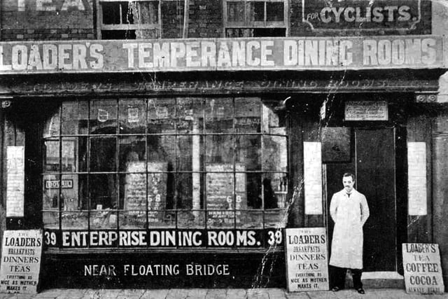 Located at the lower end of Broad Street we see Loader's Temperance Dining Rooms. The bill board outside states that the food is 'As nice as mother makes it'. 