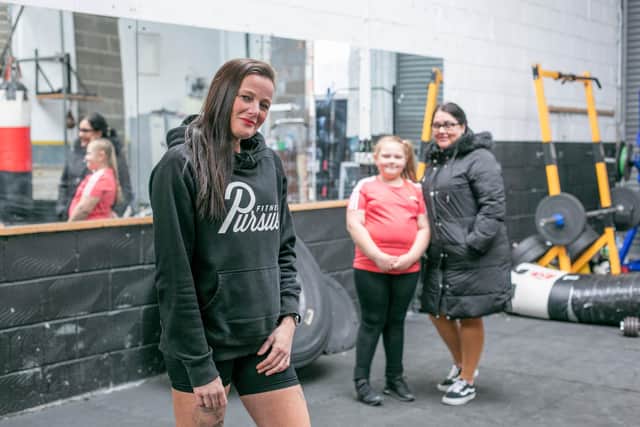 Real Life inspirational personal trainer on Gemma Petzing who works with children across the city and helping them with lose weight.
Pictured: Gemma Petzing with Nicola Simmons and her daughter, Skyla 7 at Bally Gym Fratton, Portsmouth on Friday 1st April 2022
Picture: Habibur Rahman