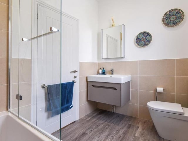 The property has four bathrooms, all of which are designed in a modern way.