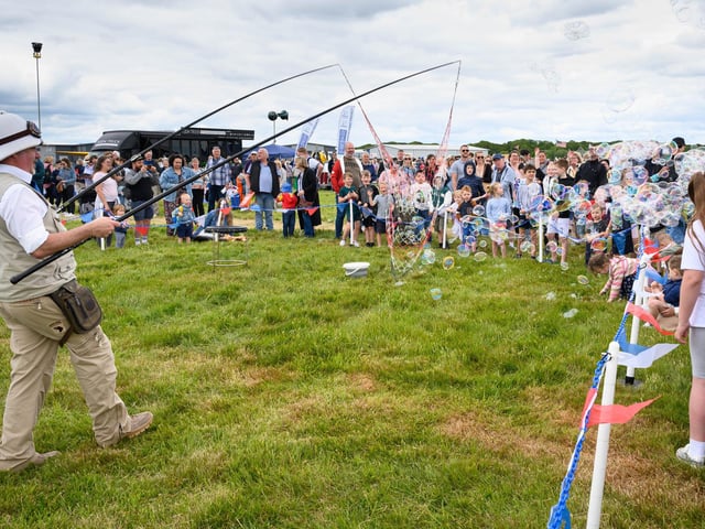 Pictured is: Children enjoying one of the entertainersPicture: Keith Woodland (080621-37)