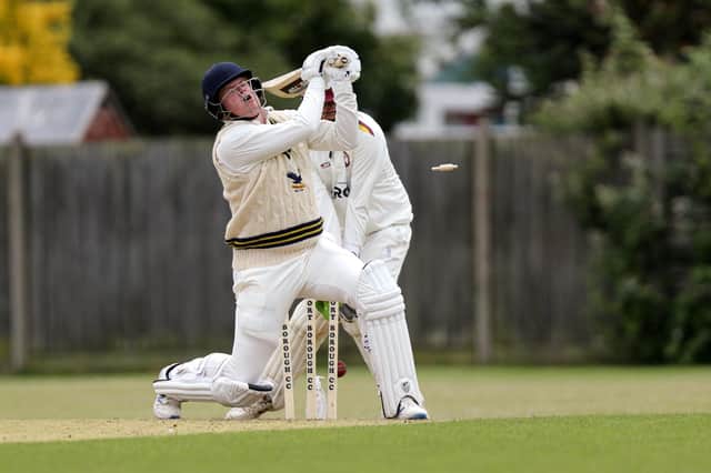 Purbrook's Josh McCoy is bowled during his side's Southern Premier League loss to Gosport Borough at Privett Park. Picture: Chris Moorhouse