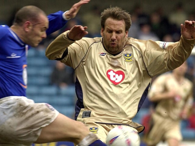 Paul Merson and Yakubu stole the show at the Den, as Pompey took a giant step towards the Premier League. A brace from the latter alongside Tim Sherwood's and Svetoslav Todorov's strikes gave the visitors a 4-0 lead at half-time. Merson's penalty completed s five-star performance from Redknapp's side as they remained at the league's summit.   Picture: Steve Reid