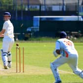 Fareham & Crofton 2nds' James Hawley is bowled by Kerala's Robish Hentry. 
Picture: Chris Moorhouse