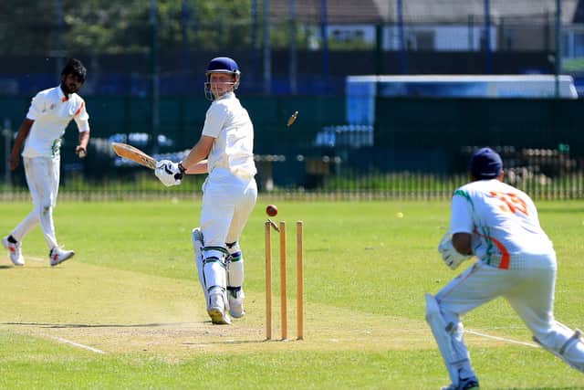 Fareham & Crofton 2nds' James Hawley is bowled by Kerala's Robish Hentry. 
Picture: Chris Moorhouse