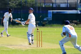 Fareham & Crofton 2nds' James Hawley is bowled by Kerala's Robish Hentry. 
Picture: Chris Moorhouse